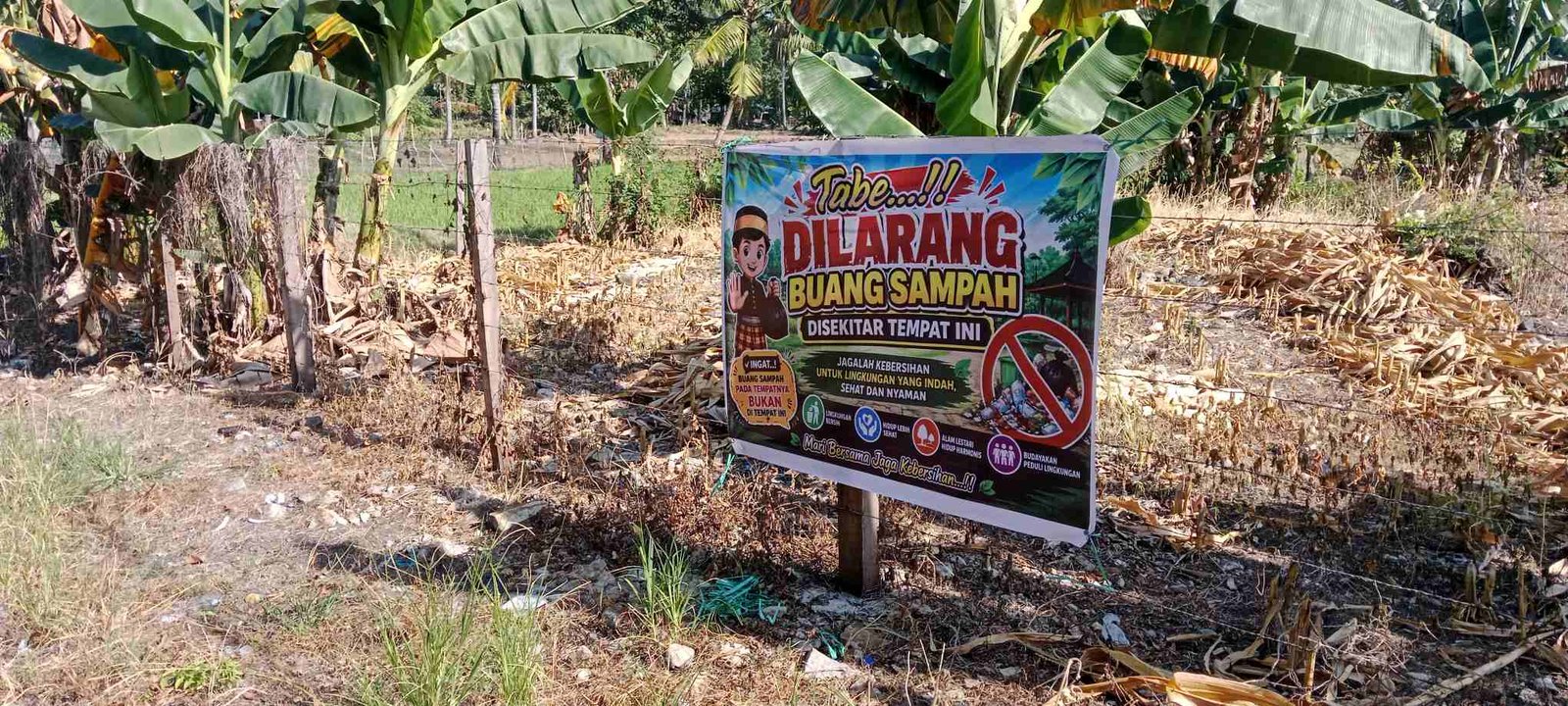 Junaidi Tegas Lawan Sampah Liar, Baliho Larangan Dipasang di Jalan Perinyameng